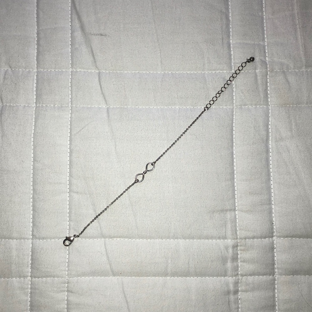 Silver infinity bracelet.